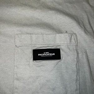 H & M Le Mec Pacifacteur Pocket T-Shirt